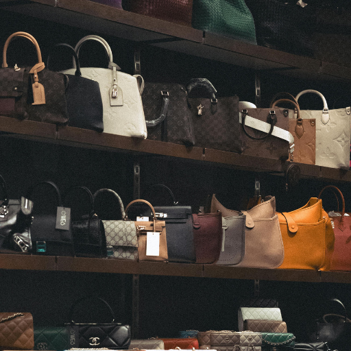 Pictures of array of purses on shelves